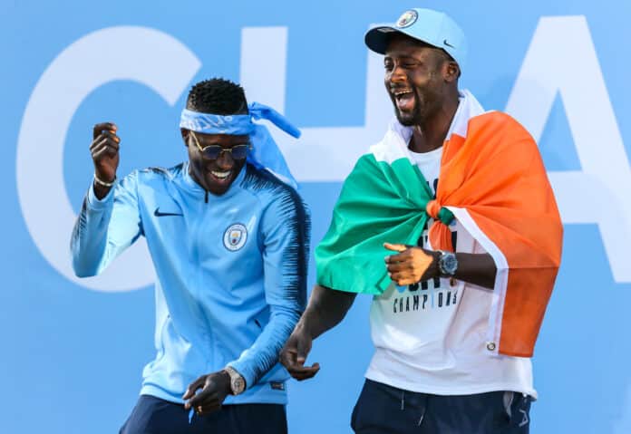 Manchester City's Yaya Tour and Benjamin Mendy